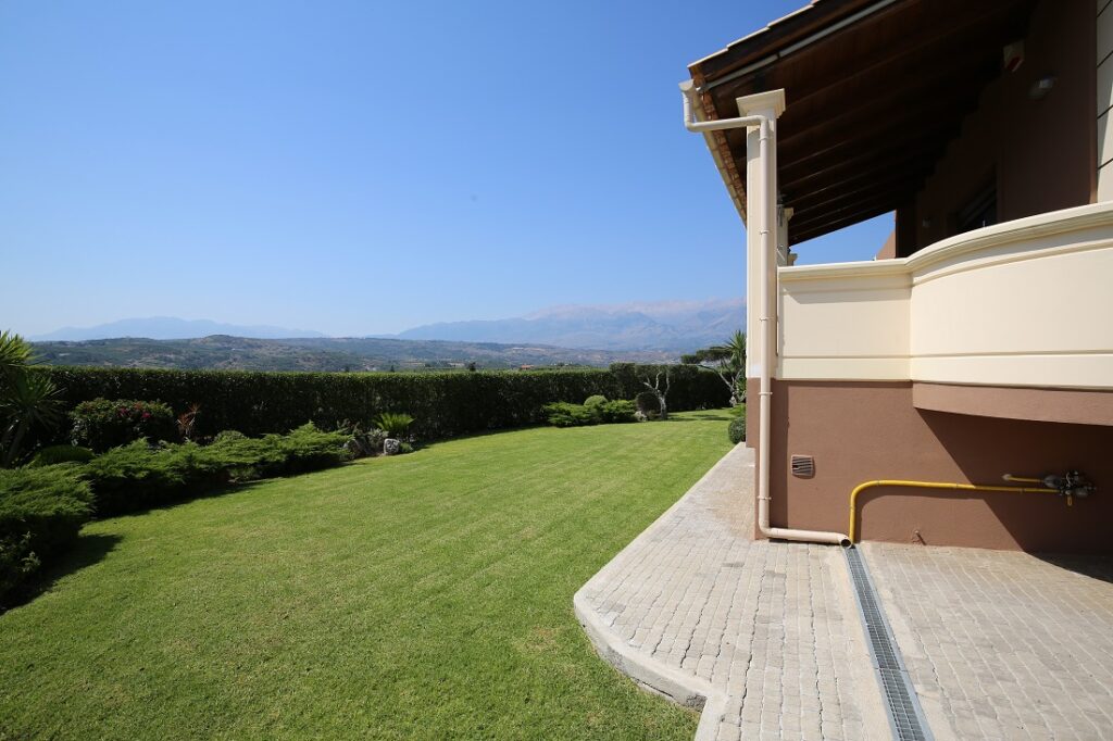 A CLASSY VILLA IN KALYVES WITH MOUNTAIN VIEW